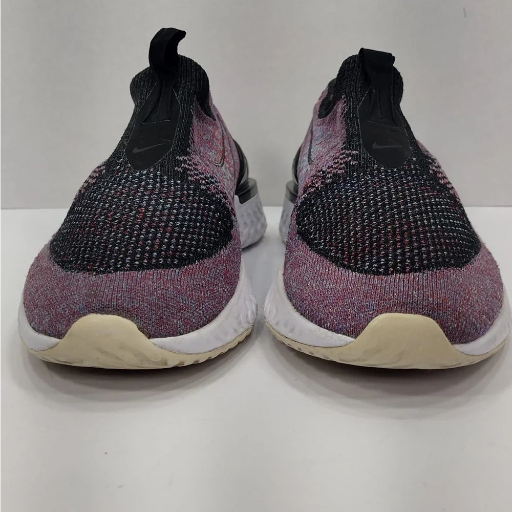Nike Multicolor Flyknit Sneakers size 9.5 pre owned Exellent condition